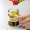 Soap Dispensing Palm With Storage Stand By Jesobo